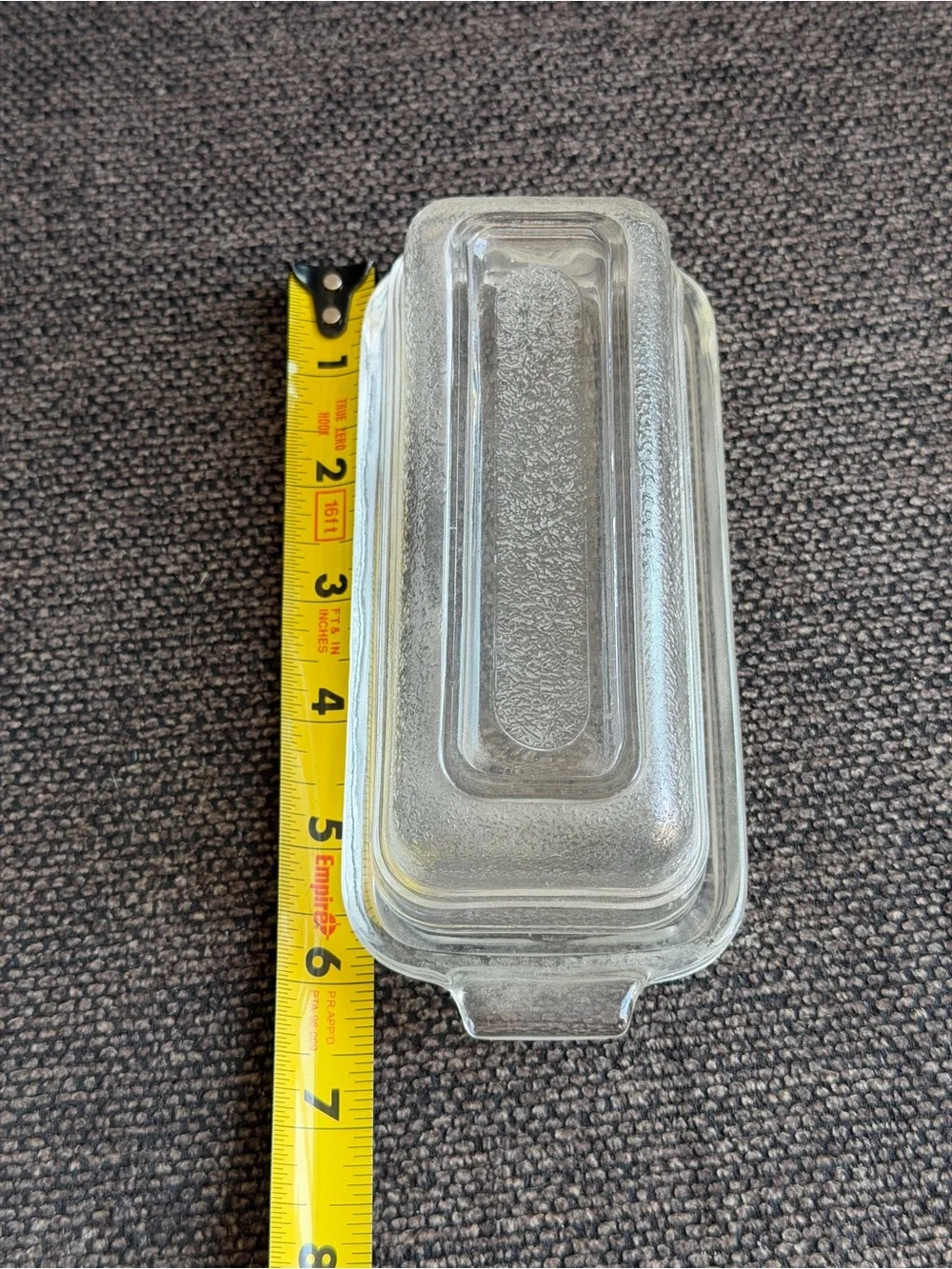 Small sized glass covered butter dish